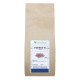 Busta kraft da 200 g di Ambretta semi interi Erbologica Amazonas Andes con immagine dei semi in etichetta.